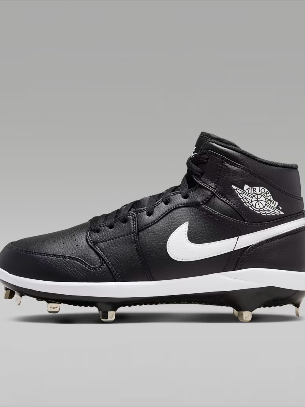 Men’s size 13 Jordan Black and White Mid-Top Athletic baseball Cleats